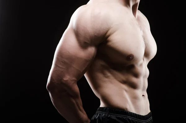 Muscular man posing — Stock Photo, Image