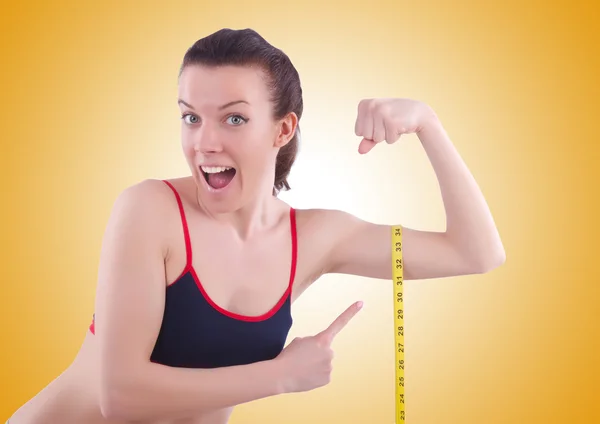 Chica con centímetro en concepto de dieta — Foto de Stock