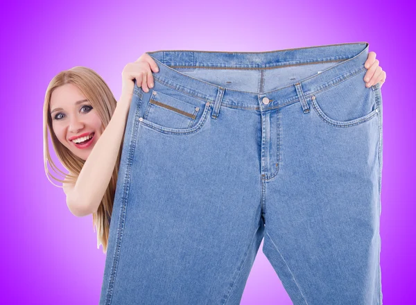 Dieting concept with oversize jeans — Stock Photo, Image