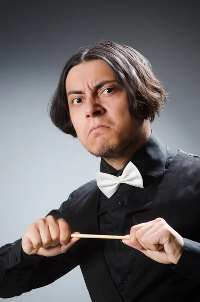 Funny conductor in musical concept — Stock Photo, Image