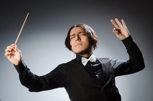 Funny conductor in musical concept — Stock Photo, Image