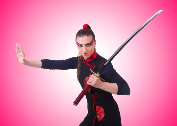Mujer en concepto de arte marcial japonés —  Fotos de Stock