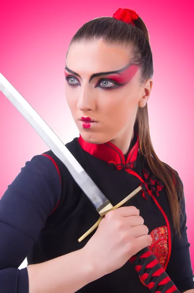 Japon dövüş sanatları konseptinde bir kadın — Stok fotoğraf