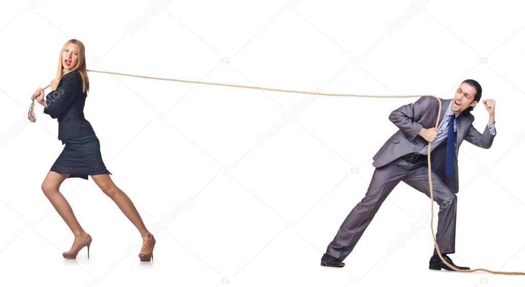 Man and woman in tug of war concept