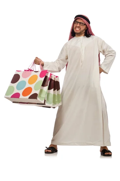 Arabe homme avec des sacs à provisions sur blanc — Photo