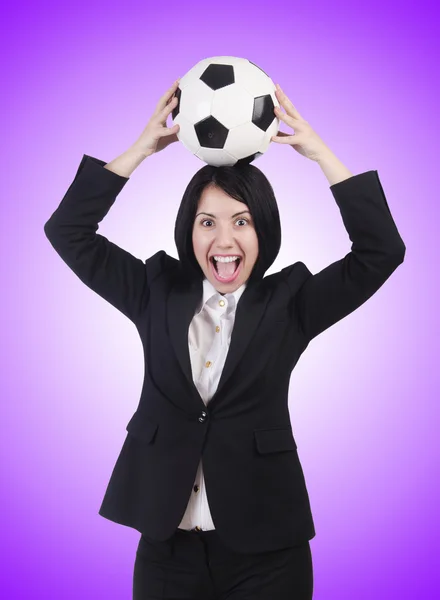 Businesswoman with ball on purple — Stock Photo, Image