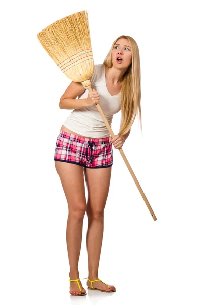 Young woman with broom isolated on white — Stock Photo, Image