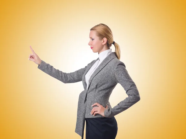 Businesswoman pressing virtual buttons — Stock Photo, Image