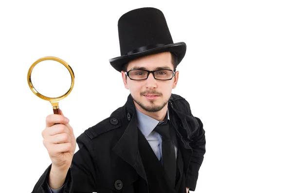 Young detective with magnifying glass isolated on white — Stock Photo, Image