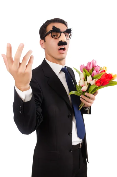 Funny man with flowers isolated on white — Stock Photo, Image