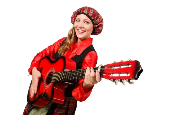 Mujer divertida en ropa escocesa con guitarra —  Fotos de Stock