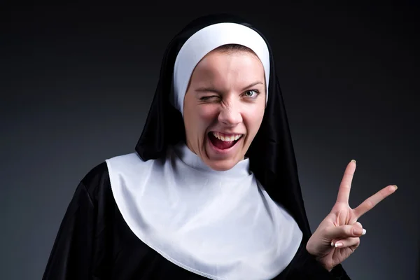 Funny nun showing victory sign — Stock Photo, Image