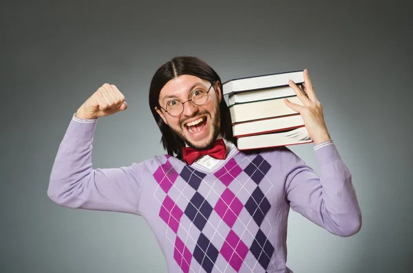 Joven estudiante con libro en concepto de aprendizaje —  Fotos de Stock