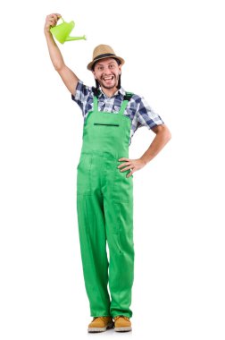 Genç, neşeli bahçıvan, sulu teneke kutusunu beyaza sarmış.