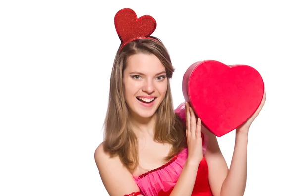 Mädchen in hübschem rosa Kleid mit Geschenkbox isoliert auf weiß — Stockfoto