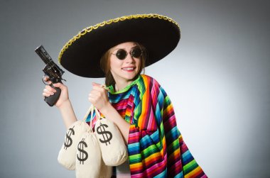 Girl in mexican poncho holding handgun and money sacks against g clipart