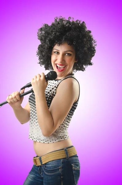 Woman with afro haircut on purple — Stock Photo, Image