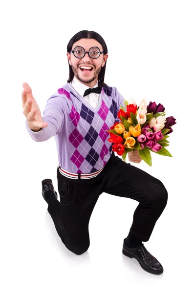 Człowiek posiadający tulipany na białym tle — Zdjęcie stockowe
