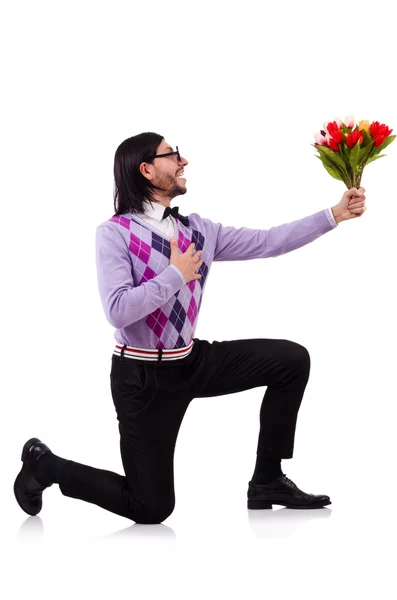 Człowiek posiadający tulipany na białym tle — Zdjęcie stockowe