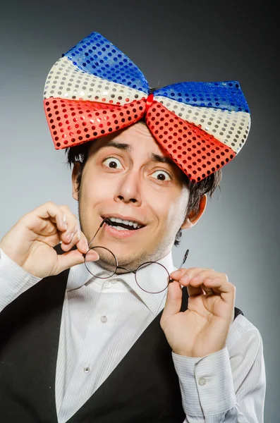 Funny man with giant bow tie — Stock Photo, Image