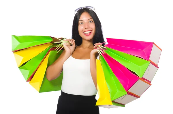 Femme avec sacs à provisions sur blanc — Photo