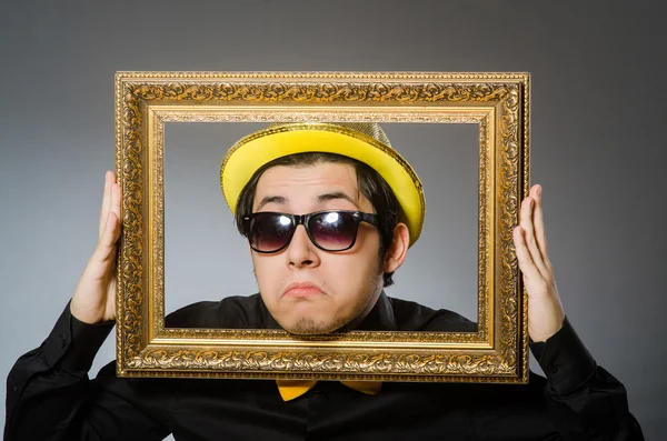 Funny man with picture frame