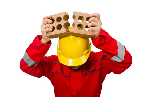 Trabajador de la construcción con ladrillos de arcilla en blanco — Foto de Stock