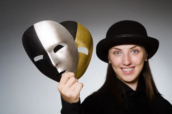 Woman with mask in funny concept — Stock Photo, Image