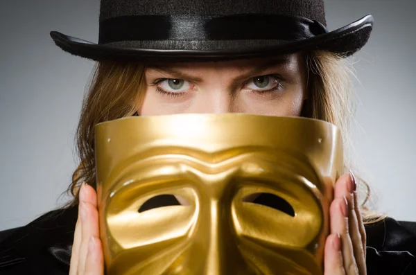 Woman with mask in funny concept — Stock Photo, Image