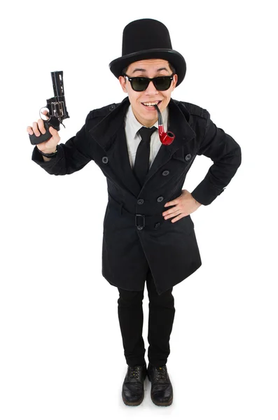 Молодий детектив в чорному пальто тримає пістолет ізольовано на білому — стокове фото