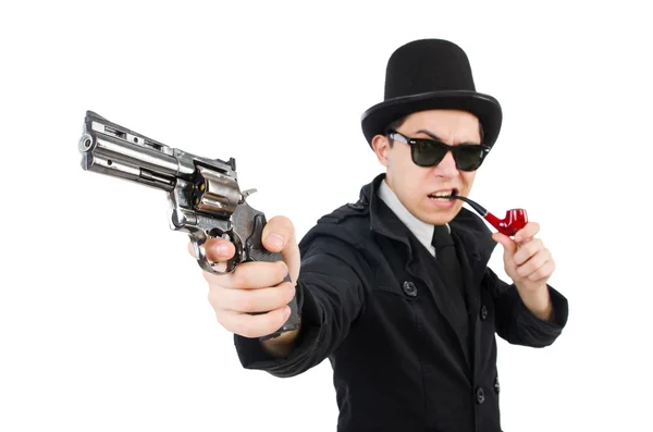 Jovem detetive de casaco preto segurando arma isolada no branco — Fotografia de Stock