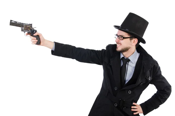 Giovane detective in cappotto nero con pistola isolata su bianco — Foto Stock