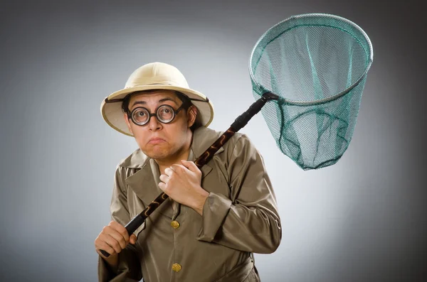 Man met safari hoed in grappig concept — Stockfoto
