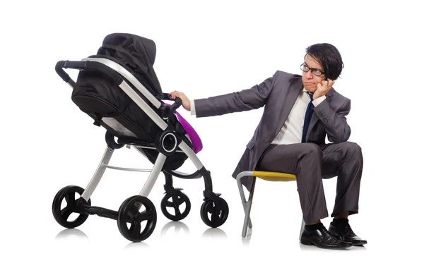 Pai engraçado com bebê e carrinho de bebê em branco — Fotografia de Stock
