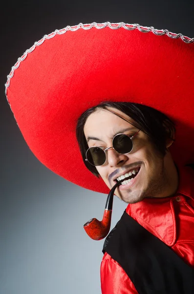 Person wearing sombrero hat in funny concept — Stock Photo, Image