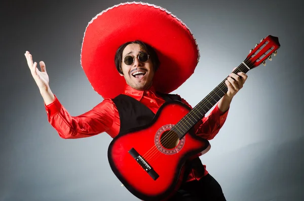 Mexican guitar player in red — Stock Photo, Image