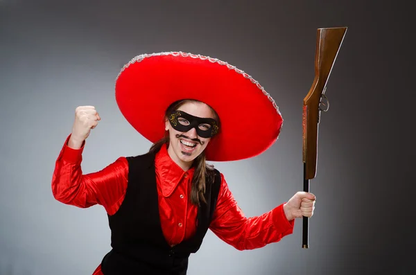 Person som bär sombrero hatt i roligt koncept — Stockfoto