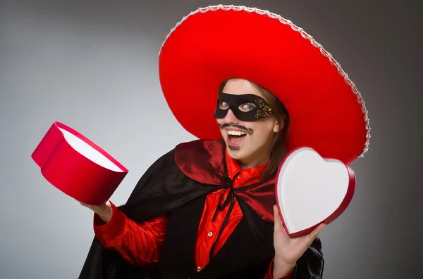 Persona che indossa cappello sombrero in concetto divertente — Foto Stock