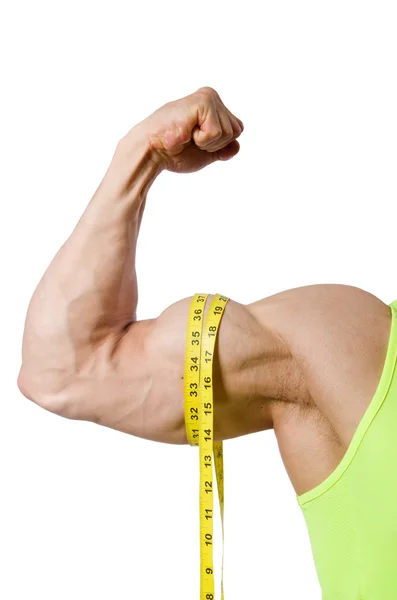 Man measuring muscles on white — Stock Photo, Image