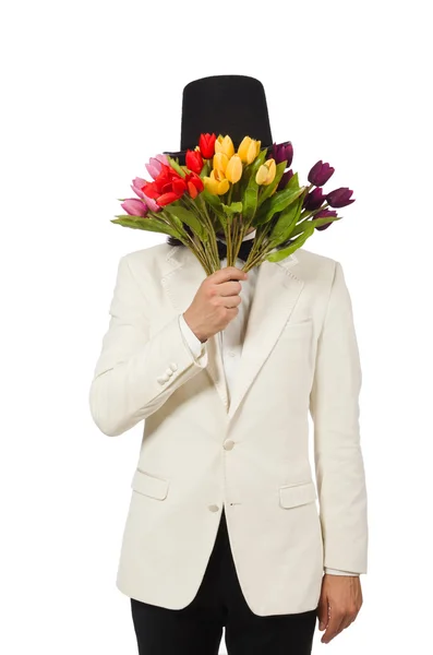 Hombre con flores de tulipán aisladas en blanco — Foto de Stock