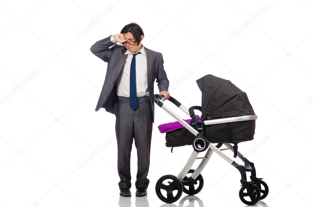 Funny dad with baby and pram on white