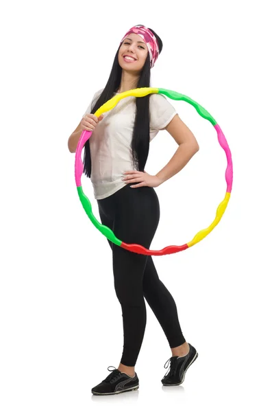 Una ragazza in tuta sportiva con hula hoop isolato su bianco — Foto Stock