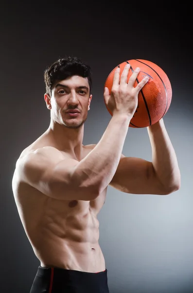 Baloncesto muscular en el concepto deportivo — Foto de Stock