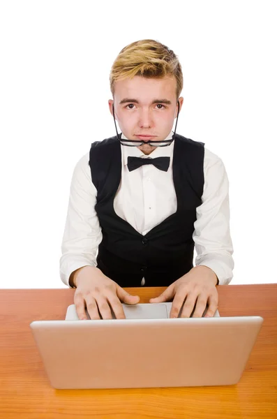 Studente intelligente seduto con laptop isolato su bianco — Foto Stock