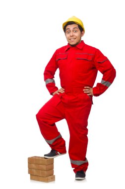 Beyaz kil tuğlalı inşaat işçisi