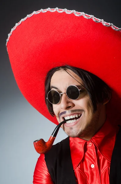 Person wearing sombrero hat in funny concept — Stock Photo, Image