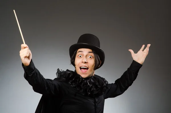 Funny magician wearing cylinder hat — Stock Photo, Image