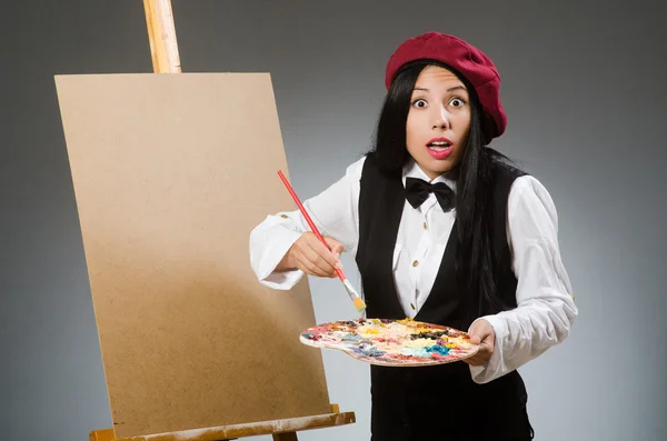 Funny artist working in the studio — Stock Photo, Image