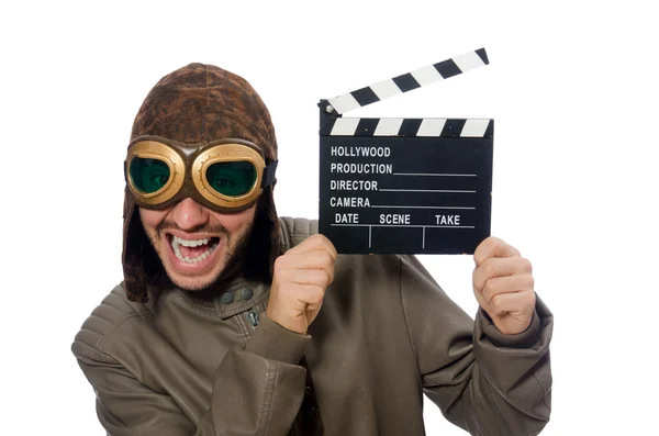 Pilot holding movie clapboard on white — Stock Photo, Image