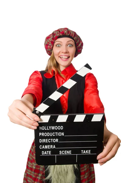 Rolig kvinna i skotska kläder med film board — Stockfoto